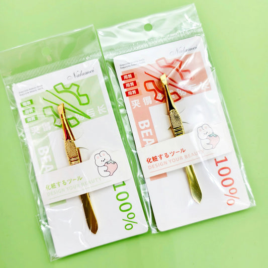 Pinza de cejas dorada de alta calidad, ligera y elegante. Venta en caja individual para mayoristas