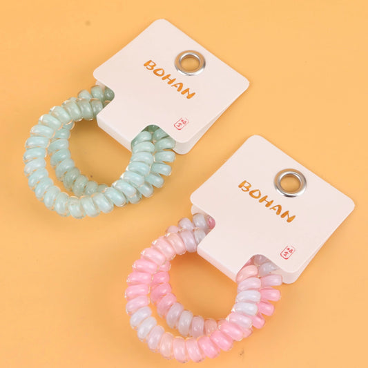 fondo tomate con Ligas para el cabello en espiral tipo cable telefónico, resistentes y coloridas. Ligero set de 21 g, ideal para mayoristas y tiendas de accesorios.