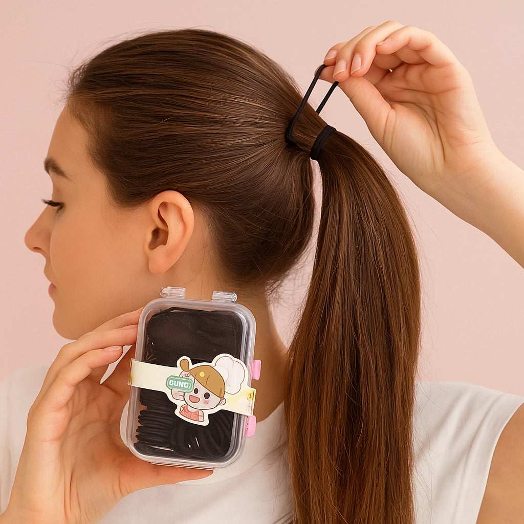 mujer sosteniendo Ligas Elásticas Negras en Caja Maleta